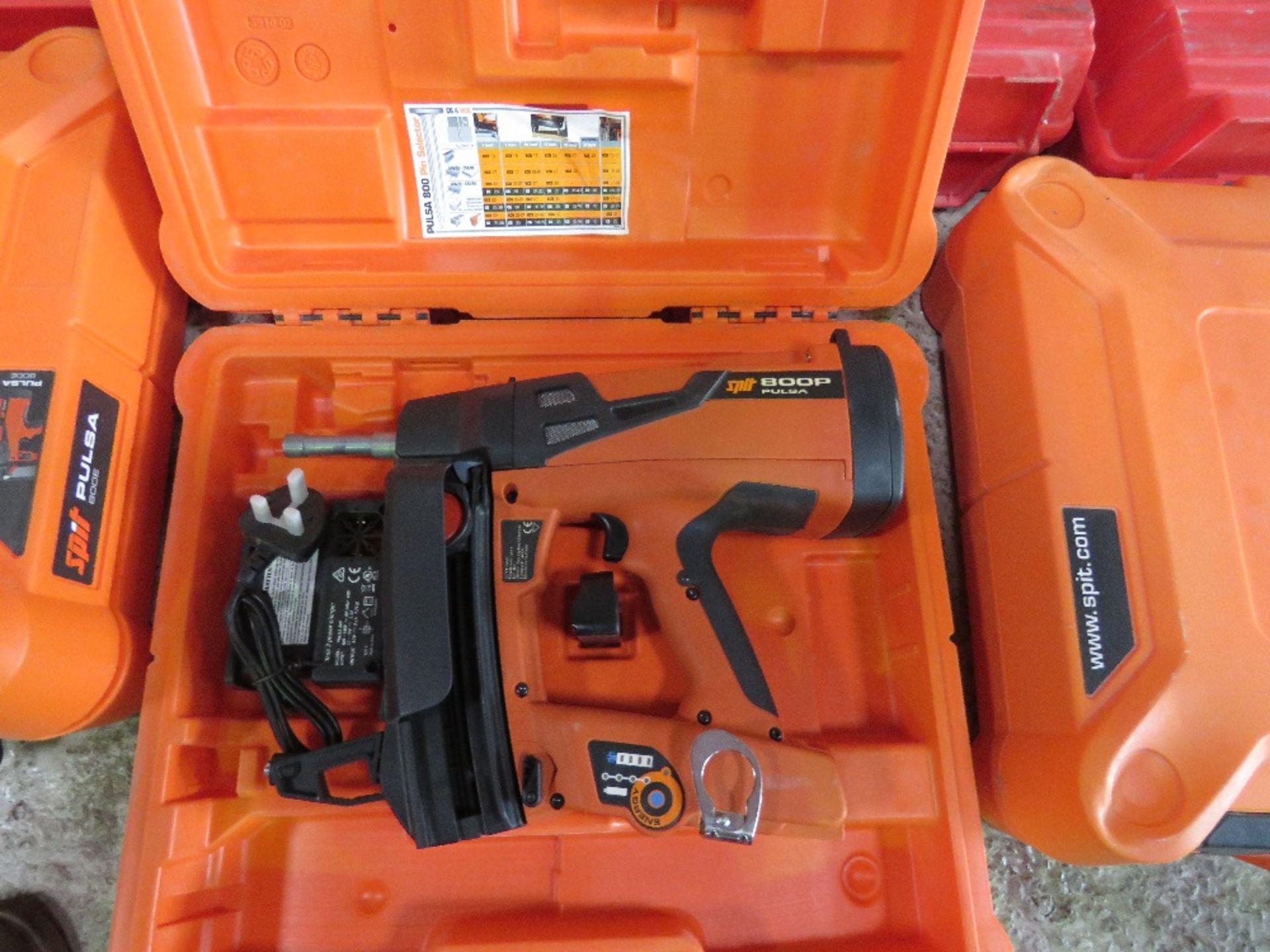 SPIT PULSA 800P NAIL GUN IN A CASE.