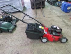 CHAMPION MOWER WITH A COLLECTOR. THIS LOT IS SOLD UNDER THE AUCTIONEERS MARGIN SCHEME, THEREFORE NO