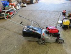 ALKO PETROL MOWER WITH A BOX. THIS LOT IS SOLD UNDER THE AUCTIONEERS MARGIN SCHEME, THEREFORE NO VAT