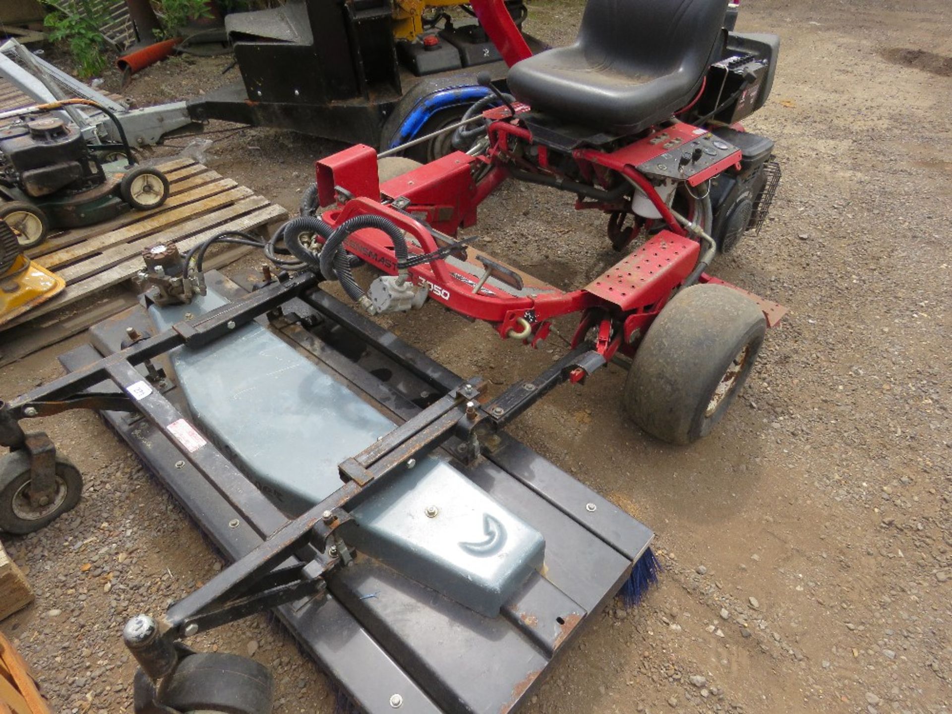 TORO GREENSMASTER 3050 WITH ROTARY POWER BRUSH ATTACHMENT. PETROL ENGINED.