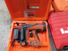 SPIT PULSA 800P NAIL GUN IN A CASE.