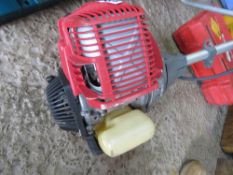 HONDA 4 STROKE HEAVY DUTY STRIMMER, WHEN TESTED WAS SEEN TO RUN AND HEAD TURNED.