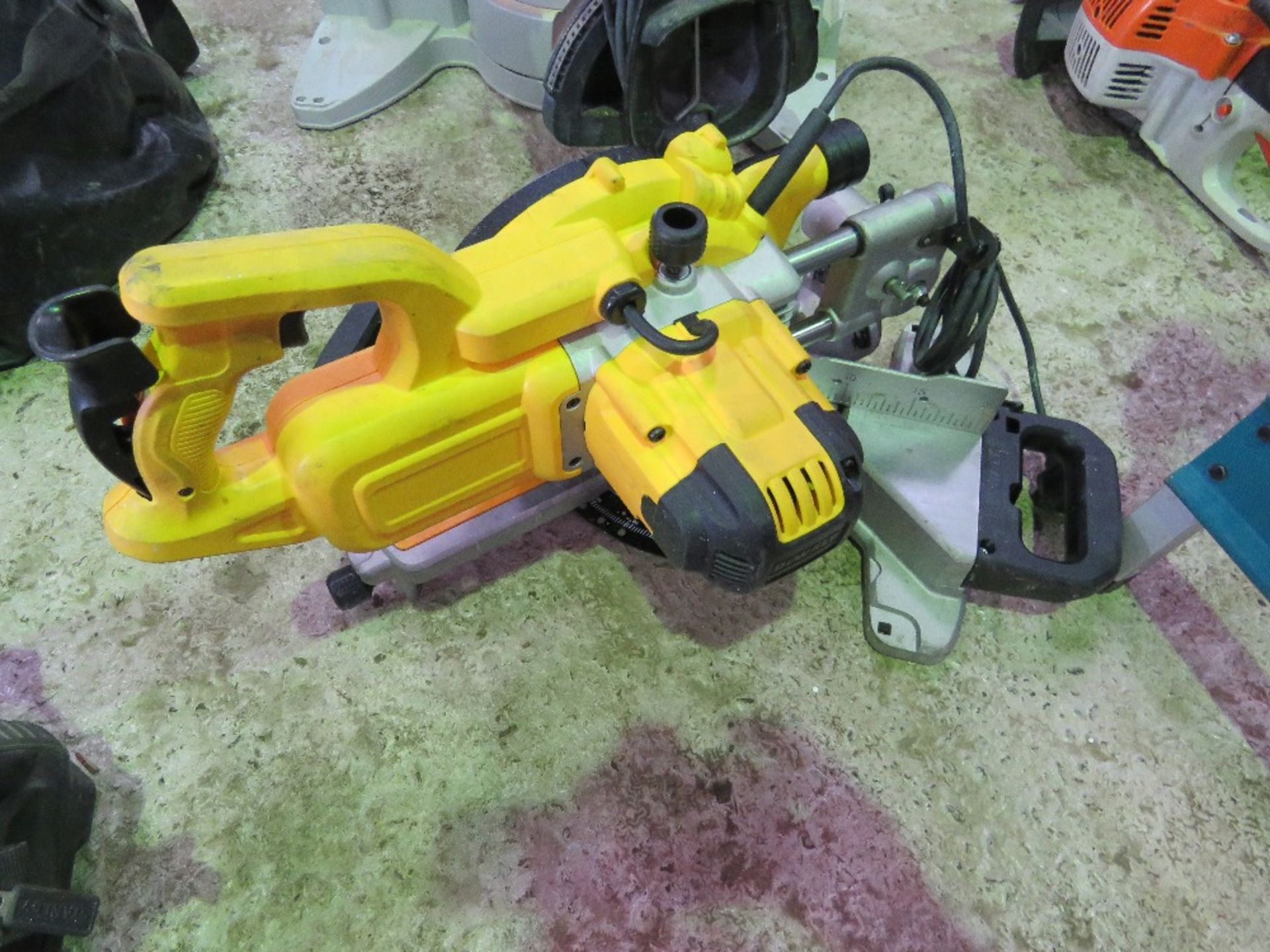 DEWALT 240V MITRE SAW THIS LOT IS SOLD UNDER THE AUCTIONEERS MARGIN SCHEME, THEREFORE NO VAT WILL B - Image 2 of 2