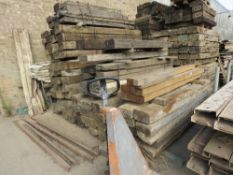 STACK CONTAINING SLEEPERS AND HEAVY TIMBERS ETC, APPROXIMATELY 73NO LENGTHS IN TOTAL. LOT LOCATION: