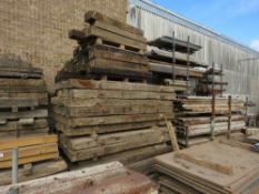 STACK CONTAINING SLEEPERS AND HEAVY TIMBERS ETC, APPROXIMATELY 130 NO LENGTHS IN TOTAL. LOT LOCATIO