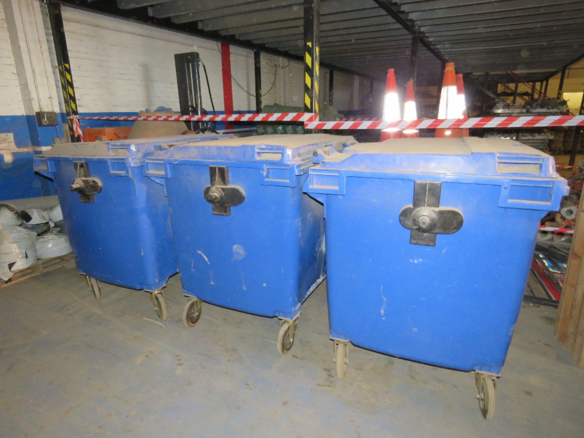 3 X LARGE BLUE WASTE BINS CONTAINING SAND PAPER. LOT LOCATION: SS13 1EF, BASILDON, ESSEX.