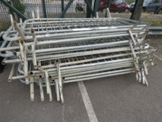 STACK OF APPROXIMATELY 20NO METAL CROWD BARRIERS. LOT LOCATION: SS13 1EF, BASILDON, ESSEX.