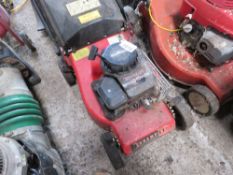 CHAMPION PETROL ENGINED MOWER WITH COLLECTOR. THIS LOT IS SOLD UNDER THE AUCTIONEERS MARGIN SCHEME,