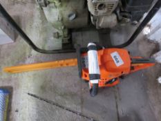 DEKO PETROL ENGINED CHAINSAW, UNUSED.