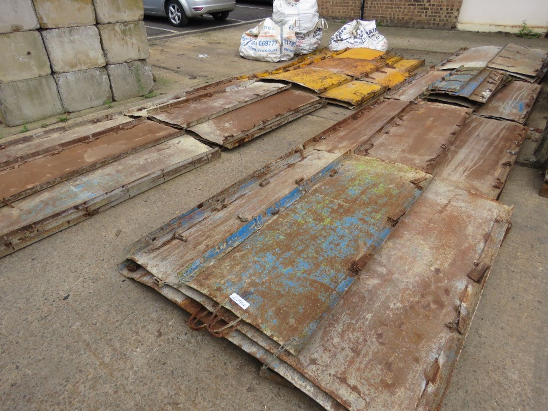 LARGE QUANTITY OF CONCRETE SHUTTERING PANELS, AS SHOWN. LOT LOCATION: EMERALD HOUSE, SWINBORNE ROAD