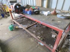 STEEL WORK BENCH WITH VICE , 8FT LENGTH APPROX (NEAR LEFT CORNER OF TIN SHED), CONTENTS EXCLUDED.