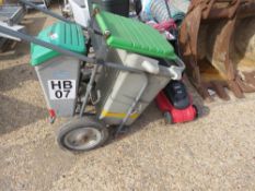 WHEELED BARROW PLUS AN ELECTRIC MOWER. THIS LOT IS SOLD UNDER THE AUCTIONEERS MARGIN SCHEME, THEREFO