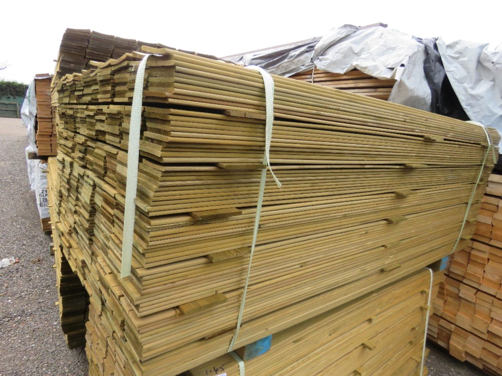 LARGE PACK OF TREATED HIT AND MISS FENCE CLADDING TIMBER BOARDS, 1.75M LENGTH X 95MM WIDTH APPROX.