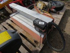 SLIDING HEAD TILE SAW, 240VOLT. THIS LOT IS SOLD UNDER THE AUCTIONEERS MARGIN SCHEME, THEREFORE NO V