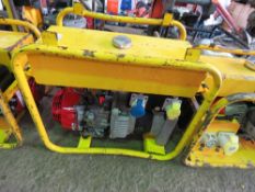 YELLOW DUAL VOLTAGE HONDA ENGINED GENERATOR.