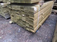 LARGE PACK OF TREATED FEATHER EDGE TIMBER CLADDING BOARDS: 1.65M LENGTH X 100MM WIDTH APPROX.