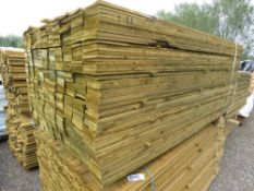 LARGE PACK OF TREATED FEATHER EDGE CLADDING TIMBER BOARDS 1.66M LENGTH X 100MM WIDTH APPROX.
