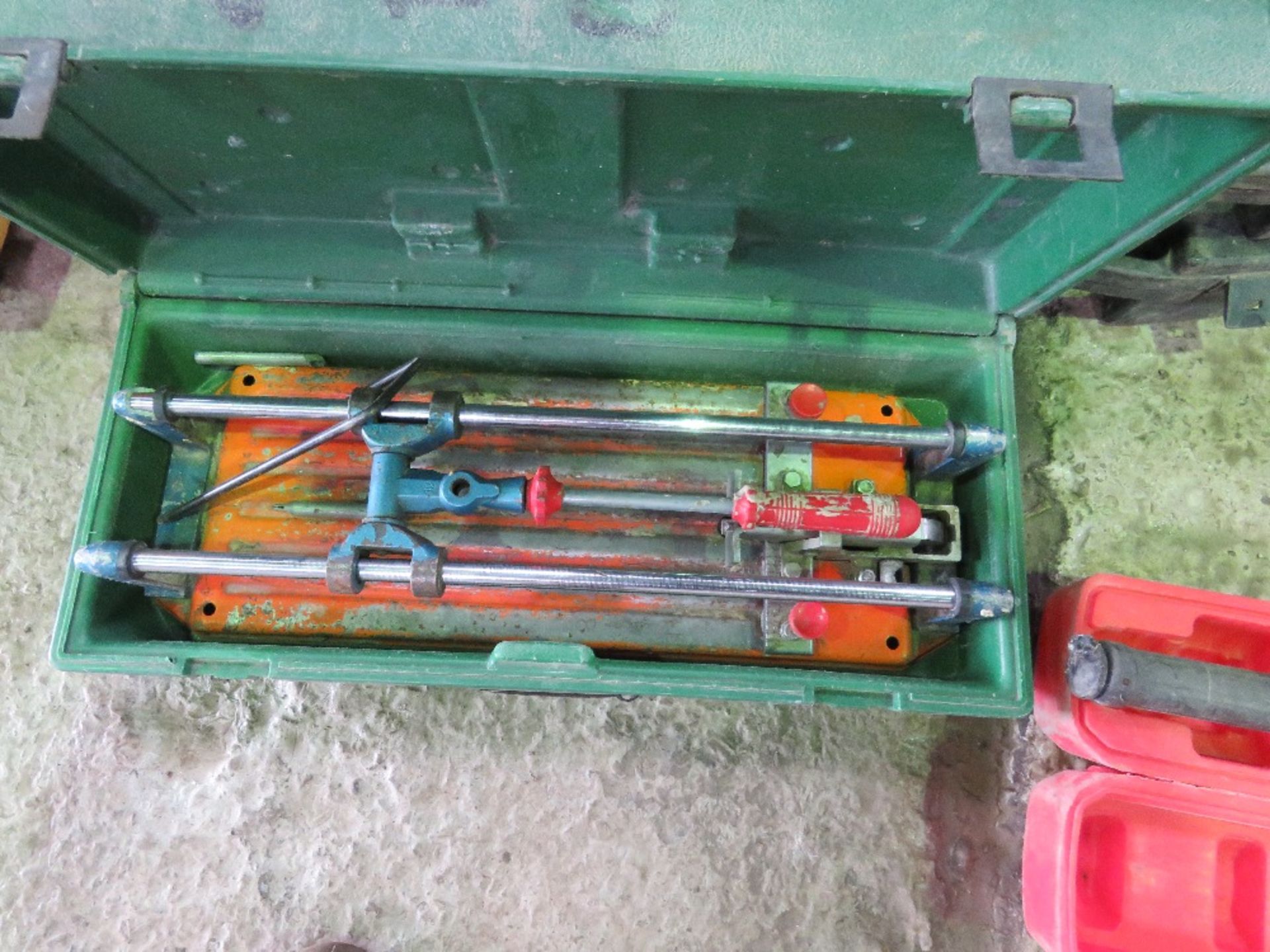 TILE CUTTER IN BOX.