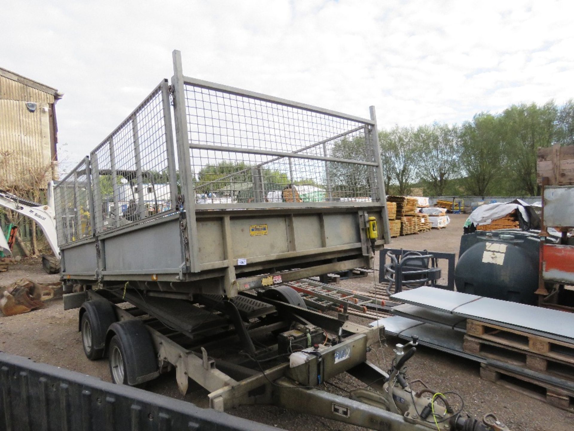 IFOR WILLIAMS TT126G TIPPING TRAILER WITH MESH CAGE SIDES ALL AROUND AND FULL LENGTH SKIDS. SN:SCK60