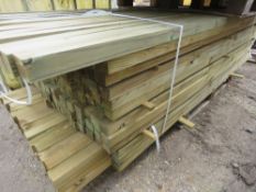 LARGE PACK OF TREATED TIMBER BATTENS/POSTS 55MM X 50MM APPROX @ 2.4-2.7M LENGTH APPROX.