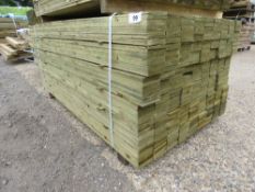 LARGE PACK OF TREATED FEATHER EDGE TIMBER CLADDING BOARDS. 1.65M LENGTH X 100MM WIDTH APPROX.
