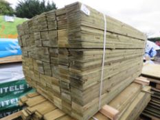 LARGE STACK OF TREATED FEATHER EDGE CLADDING TIMBER BOARDS, 1.65M LENGTH X 100MM WIDTH APPROX.