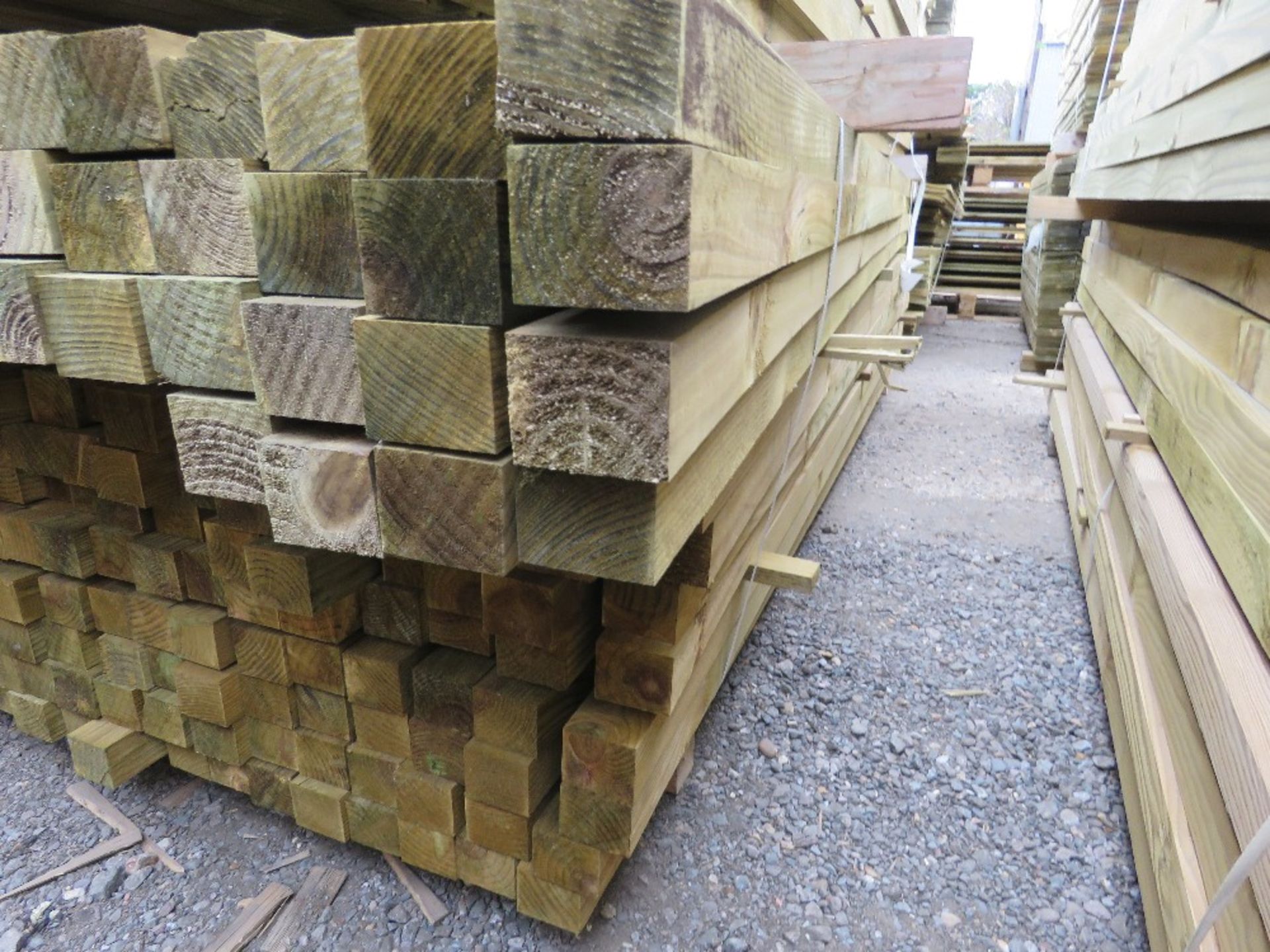 LARGE PACK OF TREATED TIMBER BATTENS: 2.4-2.7M LENGTH, 55MM X 45MM APPROX. 192NO IN TOTAL APPROX.
