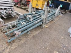 STILLAGE CONTAINING ACROW TYPE SUPPORT PROPS WITH ANCHOR PLATES. 25NO APPROX IN TOTAL. SOURCED FROM