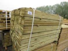 LARGE PACK OF FEATHER EDGE TREATED TIMBER CLADDING BOARDS, 1.2M LENGTH X 100MM WIDTH APPROX.