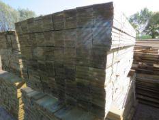 LARGE PACK OF FEATHER EDGE TREATED TIMBER FENCE BOARDS: 1.65M LENGTH X 100MM WIDTH APPROX.