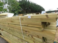 LARGE PACK OF APPROXIMATELY 192NO TREATED TIMBER BATTENS, 2.4-2.7M LENGTH APPROX, 55MMX45MM APPROX.