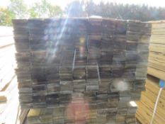 LARGE PACK OF FEATHER EDGE TREATED TIMBER FENCE BOARDS: 1.8M LENGTH X 100MM WIDTH APPROX.