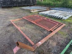 METAL GATE FRAME 2.23MW X 2.25H WITH A FIXED PANEL AND A GATE.