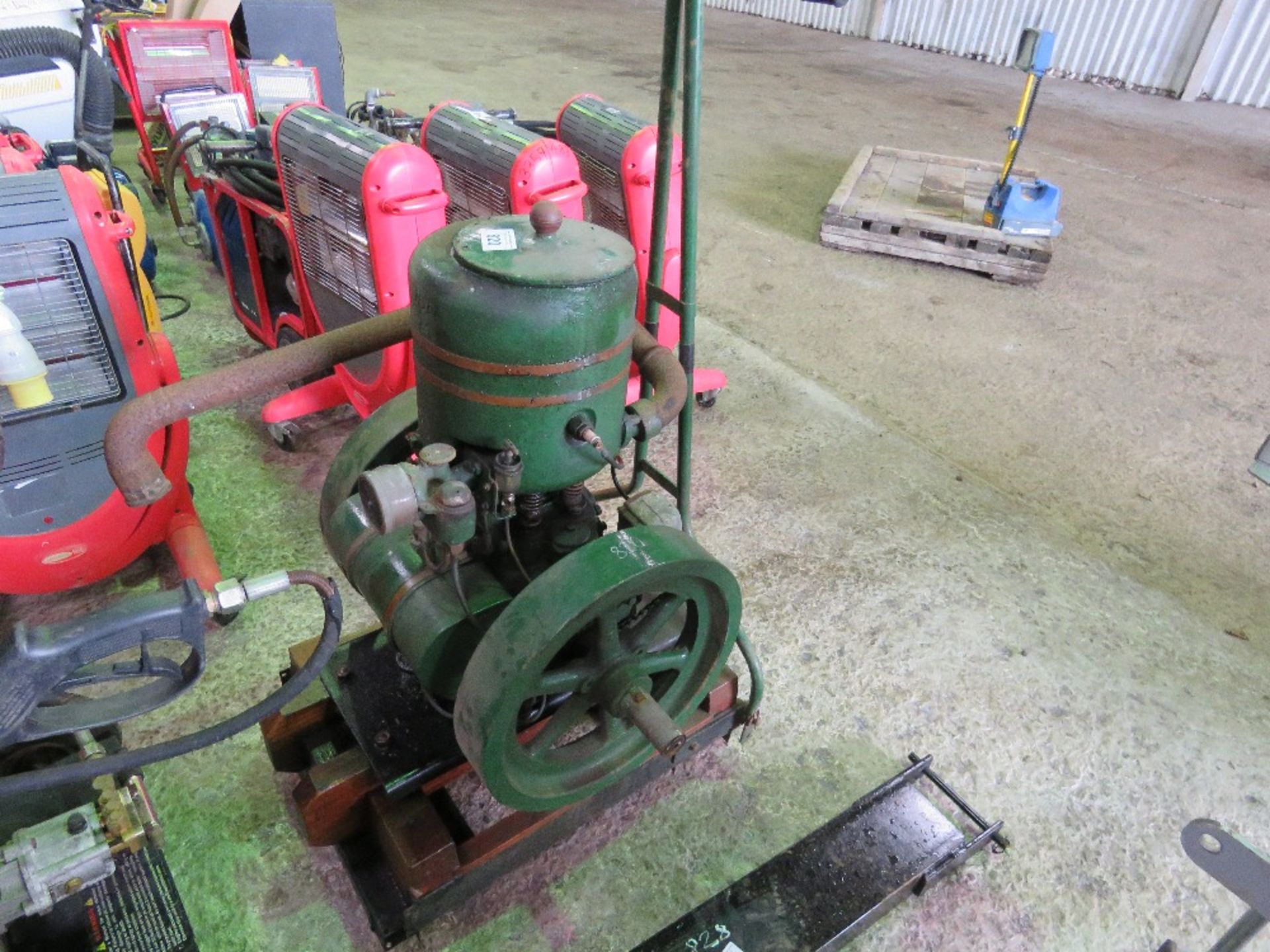 RA LISTER VINTAGE STATIONARY ENGINE ON WHEELED CHASSIS.
