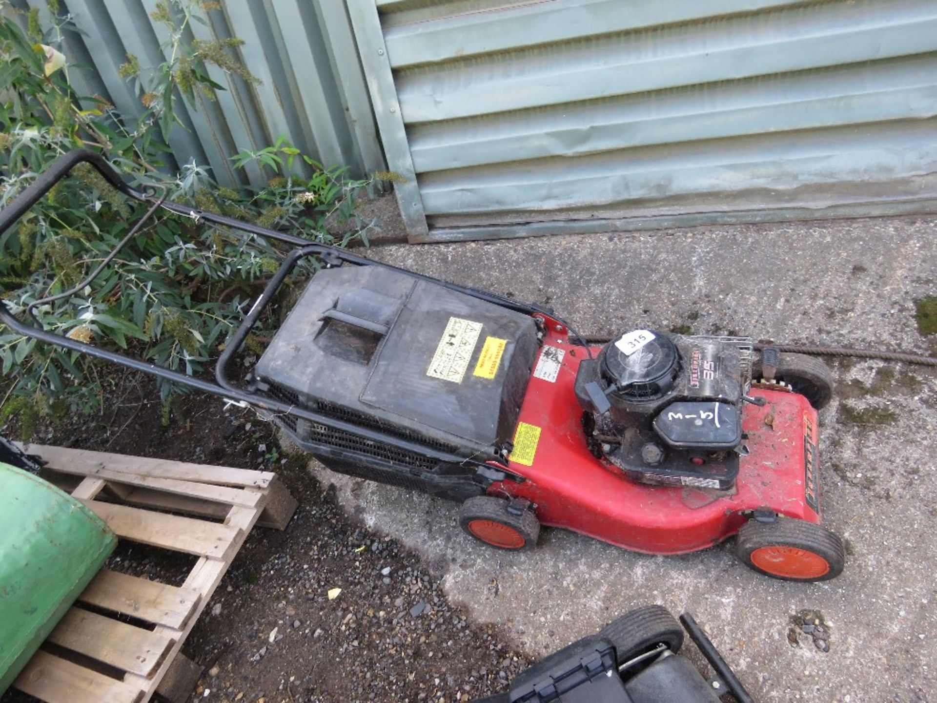 CHAMPION PETROL ENGINED MOWER WITH COLLECTOR. THIS LOT IS SOLD UNDER THE AUCTIONEERS MARGIN SCHEME,