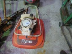 FLYMO PETROL MOWER. THIS LOT IS SOLD UNDER THE AUCTIONEERS MARGIN SCHEME, THEREFORE NO VAT WILL B