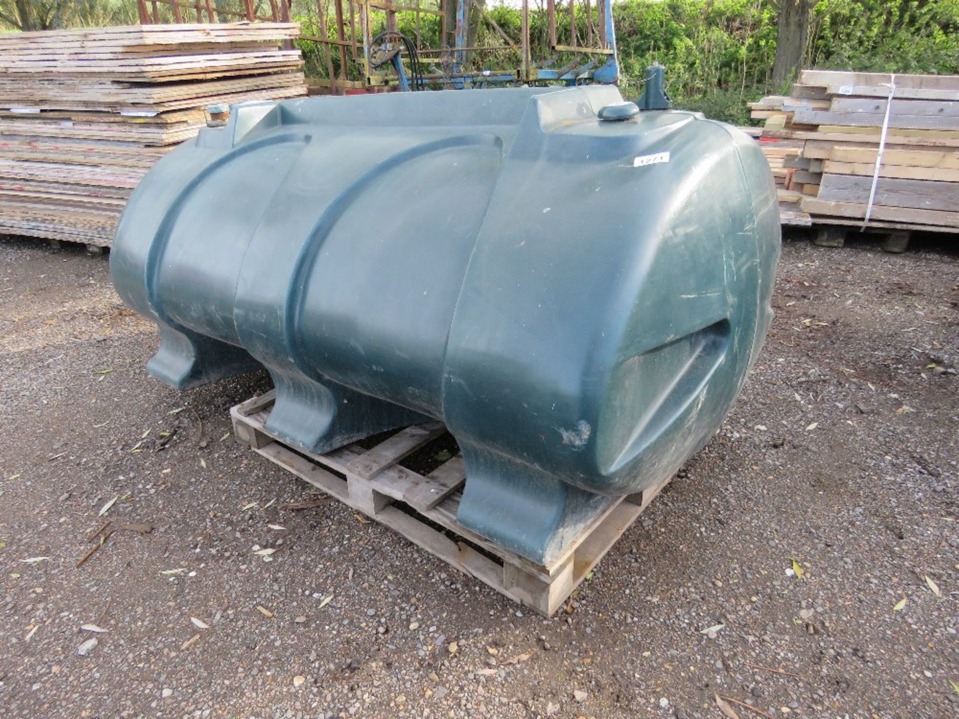 GREEN PLASTIC OIL/DIESEL STORAGE TANK. THIS LOT IS SOLD UNDER THE AUCTIONEERS MARGIN SCHEME, THER