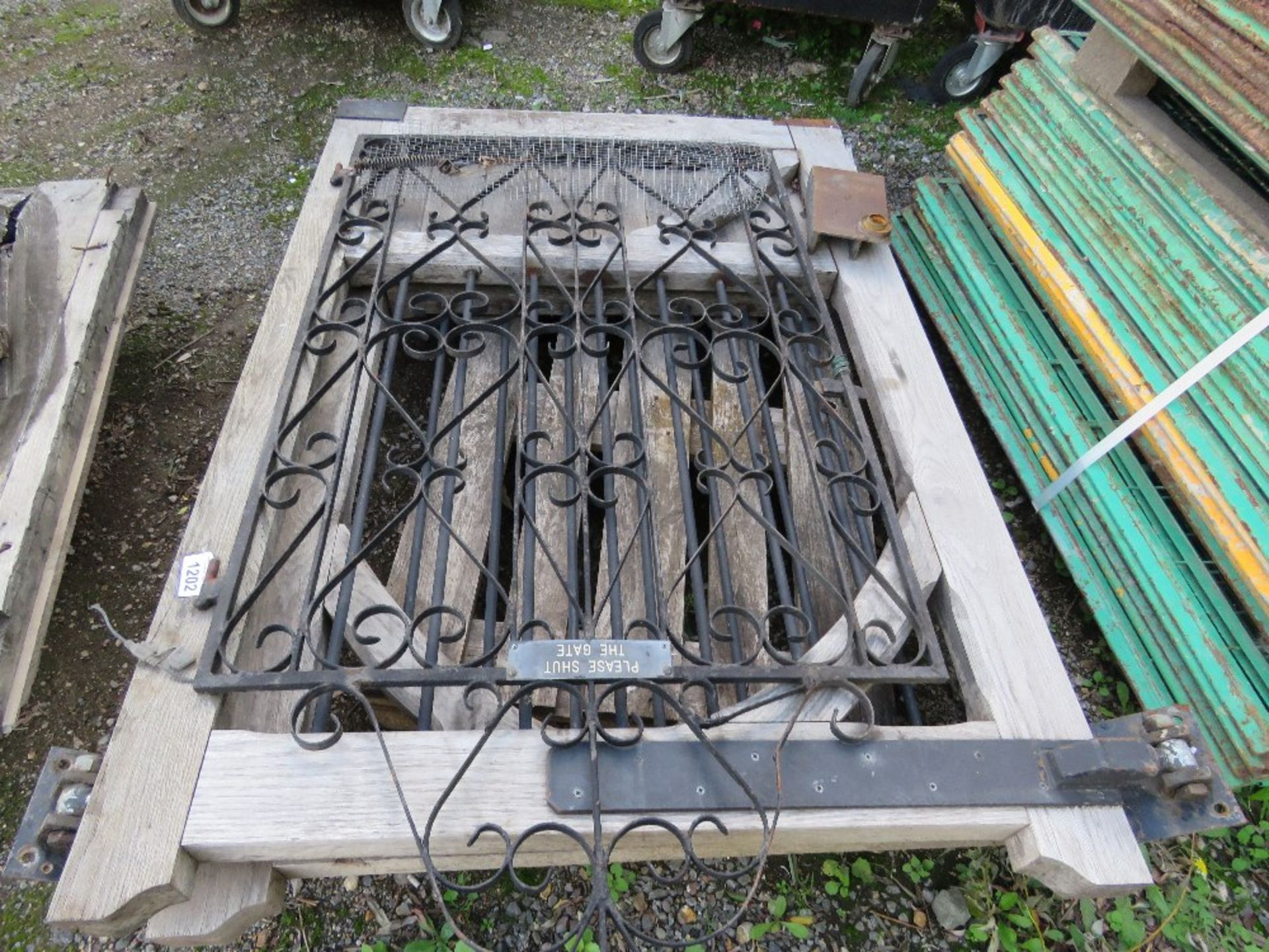 WOODEN FRAMED DECORATIVE GATES WITH WROUGHT IRON INLAY. THIS LOT IS SOLD UNDER THE AUCTIONEERS MA