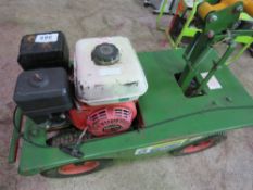PETROL ENGINED TURF CUTTER. WHEN TESTED WAS SEEN TO RUN AND BLADE MOVED. THIS LOT IS SOLD UNDER T