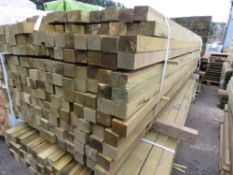 LARGE PACK OF TREATED TIMBER BATTENS: 2.4-2.7M LENGTH, 55MM X 45MM APPROX. 192NO IN TOTAL APPROX.