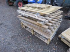 STACK OF ASSRTED LOW WOODEN GARDEN GATES.