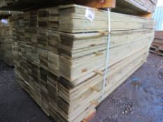 LARGE PACK OF PRESSURE TREATED FEATHER EDGE CLADDING TIMBER BOARDS. 1.8M X 100MM APPROX.