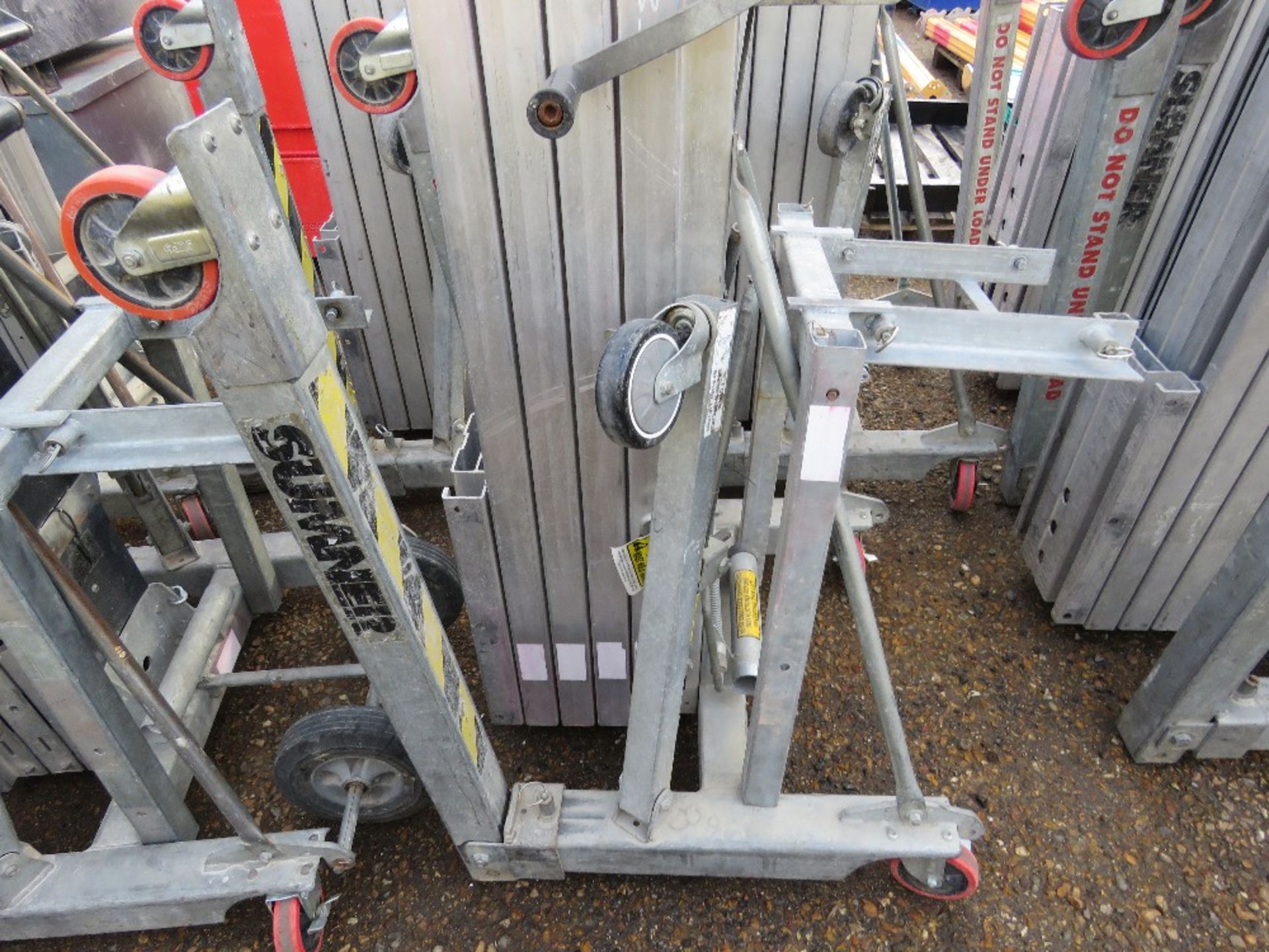 SUMNER MODEL 2020 MATERIAL LIFT, 4 STAGE, WITH A SET OF FORKS.