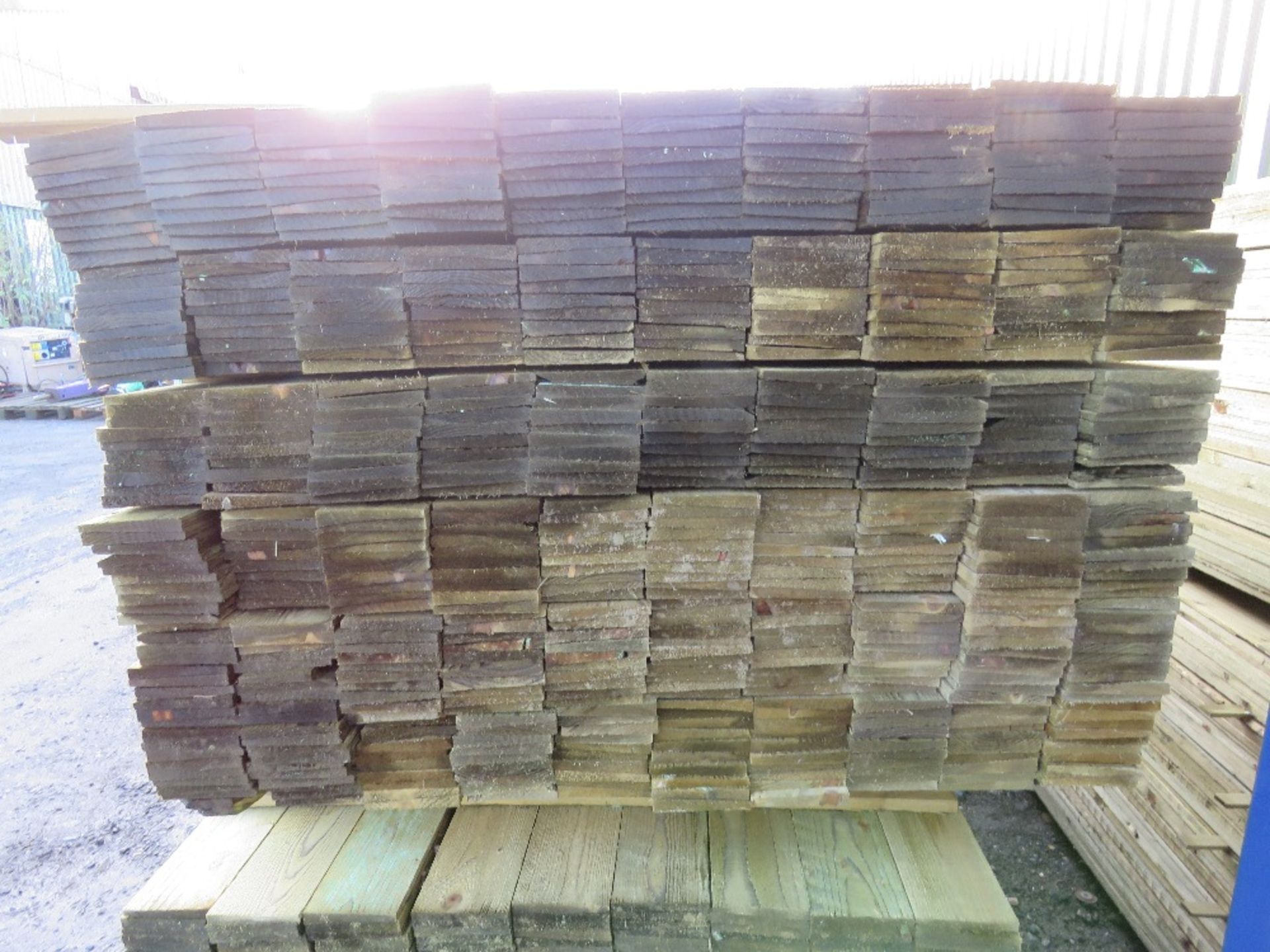 LARGE PACK OF PRESSURE TREATED FEATHER EDGE CLADDING TIMBER BOARDS. 1.8M X 100MM APPROX. - Image 2 of 3