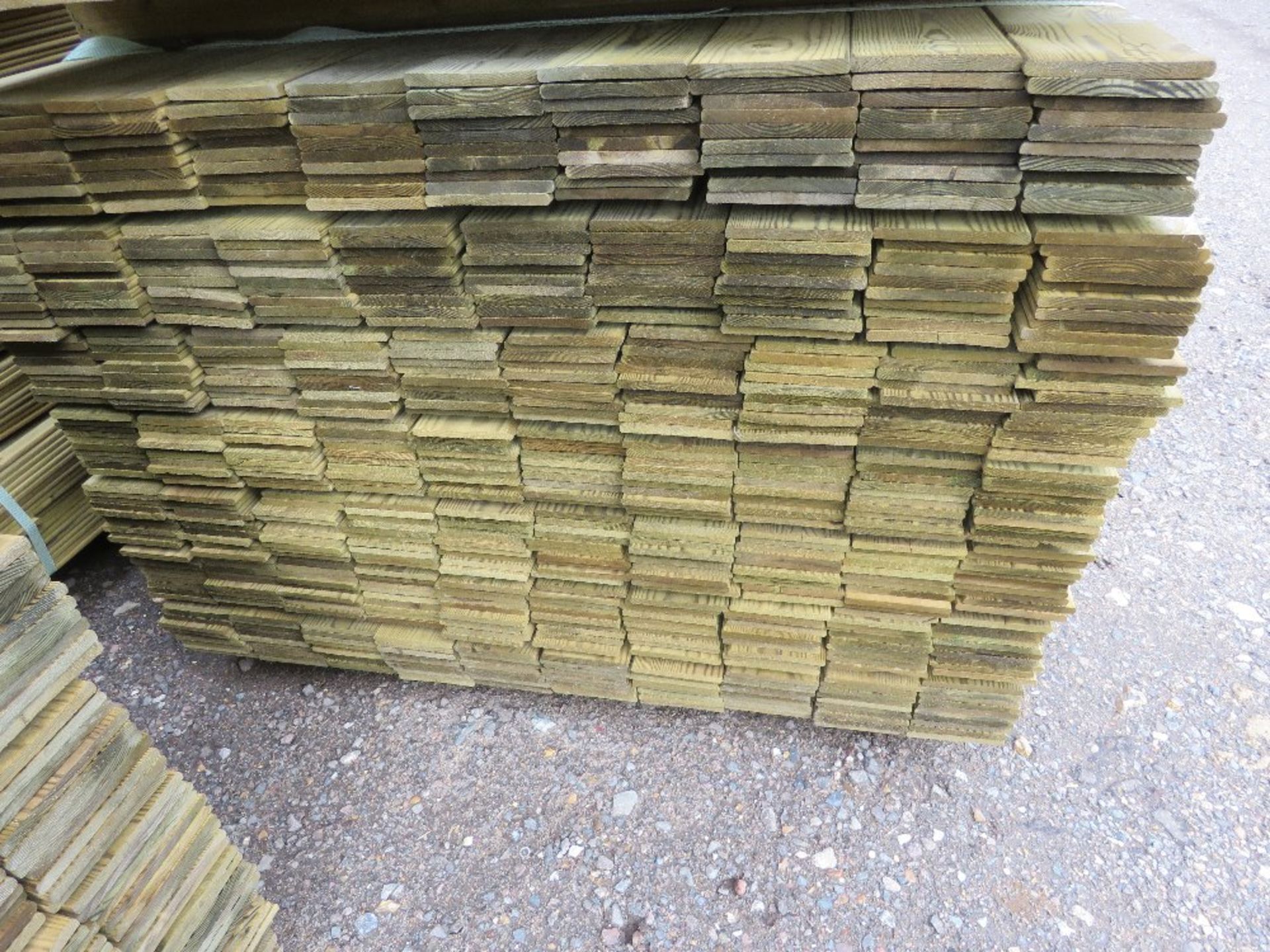 LARGE PACK OF TREATED HIT AND MISS TIMBER CLADDING BOARDS. 1.75M LENGTH X 95MM WIDTH APPROX. - Image 2 of 3