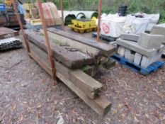 STILLAGE CONTAINING APPROXIMATELY 13NO TIMBER SLEEPERS.