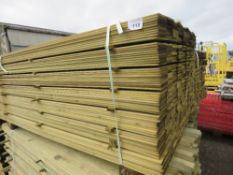 LARGE PACK OF TREATED HIT AND MISS TIMBER CLADDING BOARDS. 1.75M LENGTH X 95MM WIDTH APPROX.