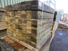 LARGE PACK OF PRESSURE TREATED FEATHER EDGE CLADDING TIMBER BOARDS. 0.9M X 100MM APPROX.