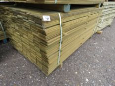 LARGE PACK OF TREATED HIT AND MISS TIMBER CLADDING BOARDS. 1.75M LENGTH X 95MM WIDTH APPROX.