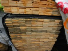 STACK CONTAINING 2 BUNDLES OF UNTREATED HIT AND MISS TIMBER CLADDING BOARDS . 1.55M LENGTH APPROX.